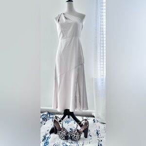 One shoulder Sam Edelman, beautiful cream color.